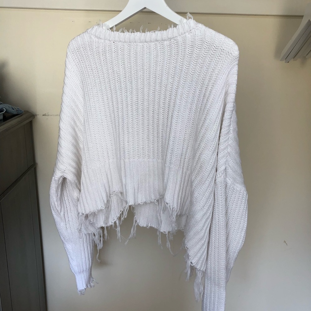 white distressed sweater